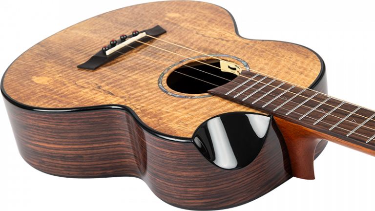 Flight Maia Steel String Baritone Ukulele: Solid mango top, rosewood body, steel strings, scalloped cutaway, &amp; active pickup for rich, bright tone. Includes gigbag Ukulele Trading Co Australia