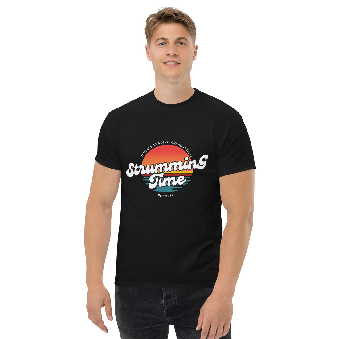 “Strumming Time” unisex T-shirt for ukulele players and music lovers.